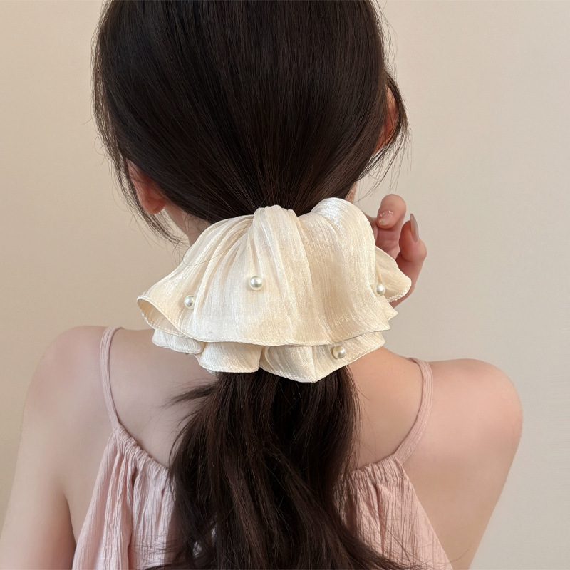 Diadema de malla de perlas de  - Travel Accessories High End reseña y precio